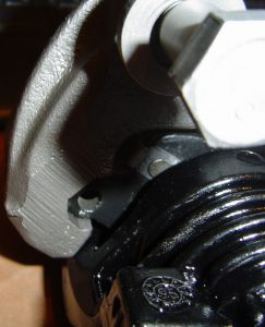 C4 Corvette front brake caliper, bracket, pads installed